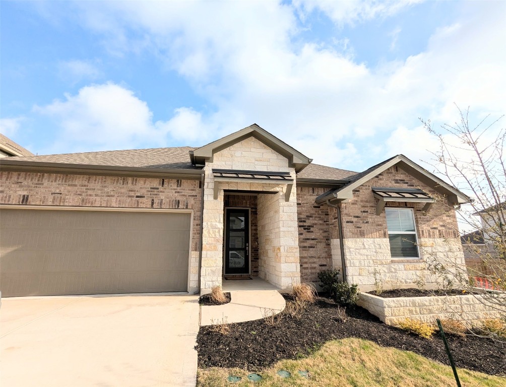 4508 Rhythmic Drive Pflugerville, TX 78660 - Photo 1 of 1 a front view of a house with a yard