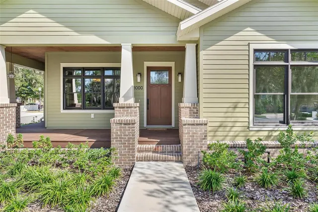 a front view of a house with a porch