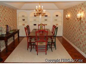 242 Kenlyn Road Palm Beach, FL 33480 - Photo 3 of 7 a view of a dining room with furniture and chandelier