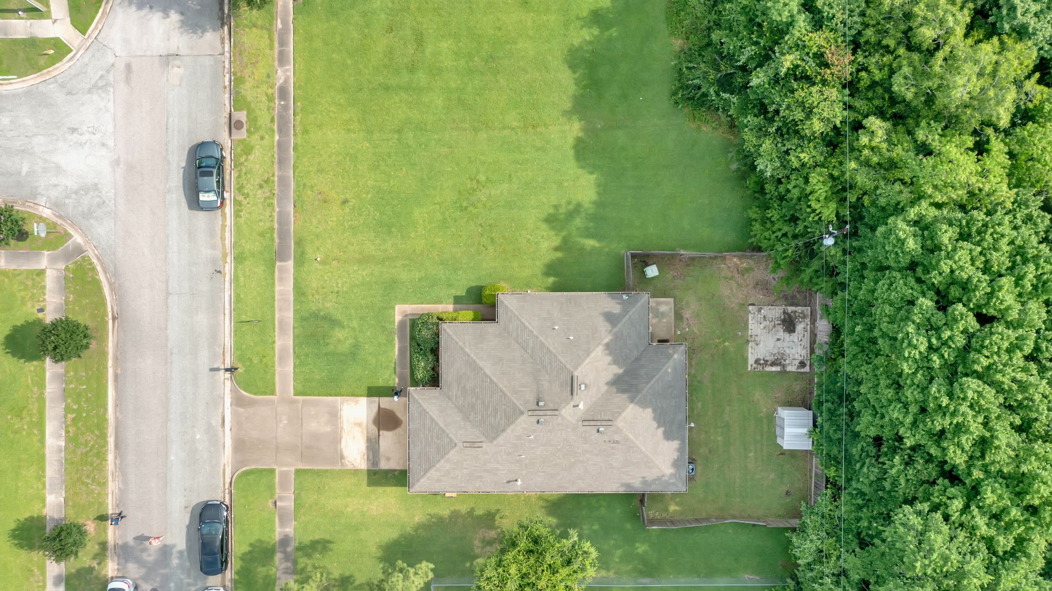 12821 Donegal Way Houston, TX 77047 - Photo 18 of 18 an aerial view of a house with swimming pool garden and tall trees