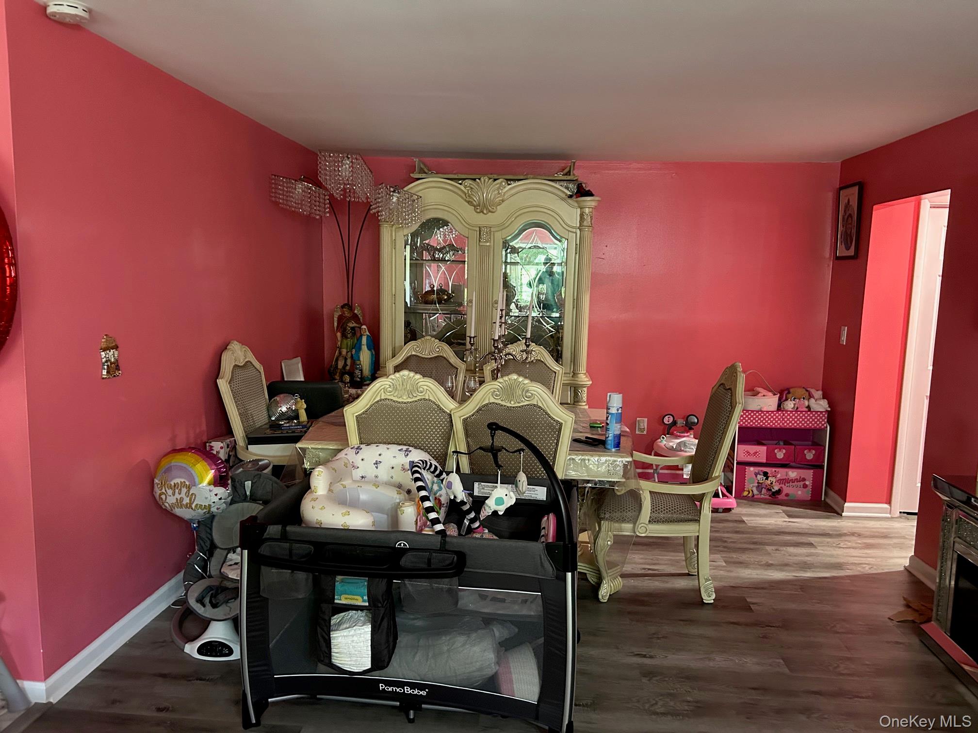 2 Secora Road, Unit C20 Monsey, NY 10952 - Photo 12 of 34 a view of a dining room with furniture and wooden floor