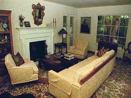 1509 East Valley Road, Unit 2 Montecito, CA 93108 - Photo 3 of 3 a living room with furniture and a fireplace