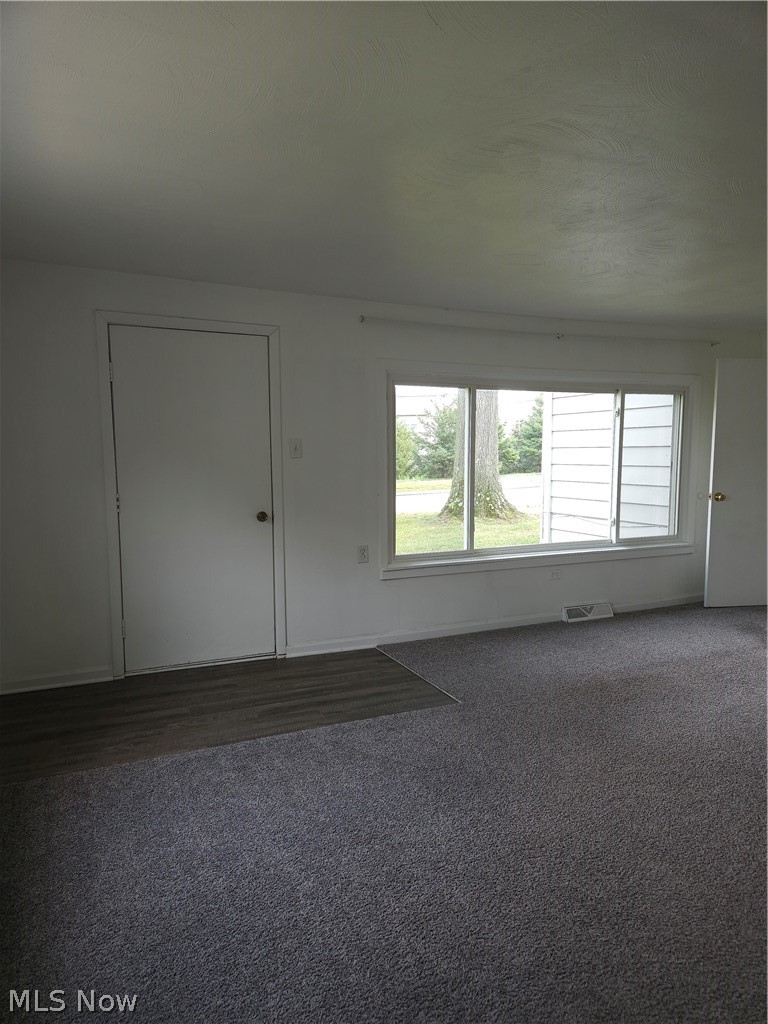 4660 Darrow Road Stow, OH 44224 - Photo 3 of 25 Living room and front door