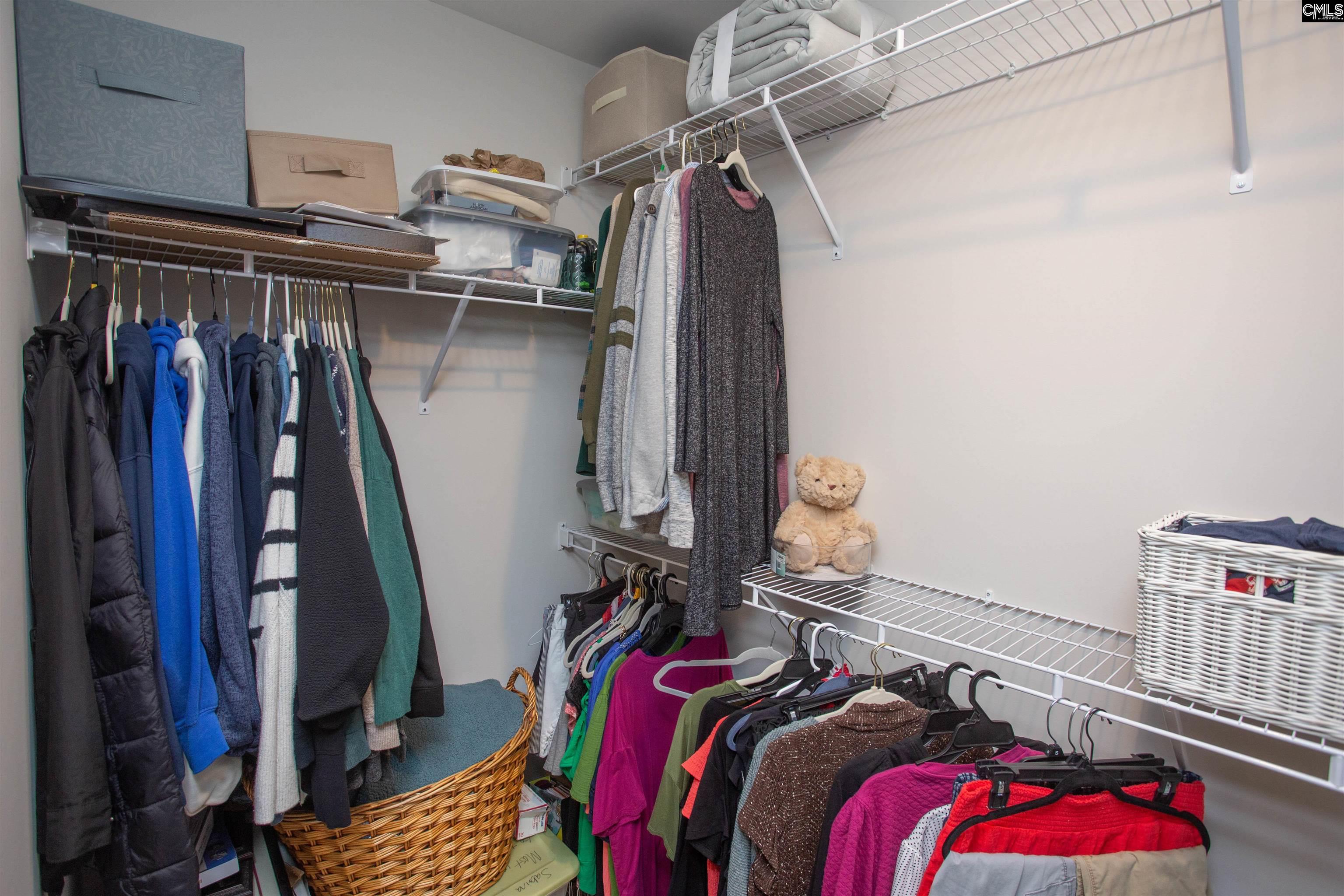 272 Shadowbrook Way Camden, SC 29020 - Photo 20 of 43 a view of walk in closet with clothes and shoes