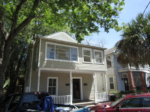 a front view of a house with balcony