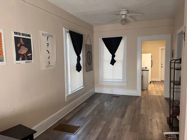 a view of entryway with wooden floor
