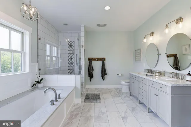 a bed room with a bed and a window