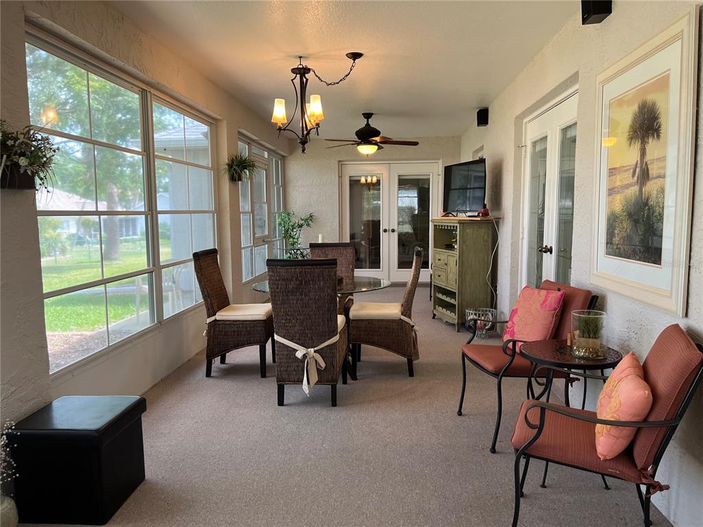 5333 Northwest 25th Loop Ocala, FL 34482 - Photo 12 of 20 a view of a dining room with furniture window and outside view