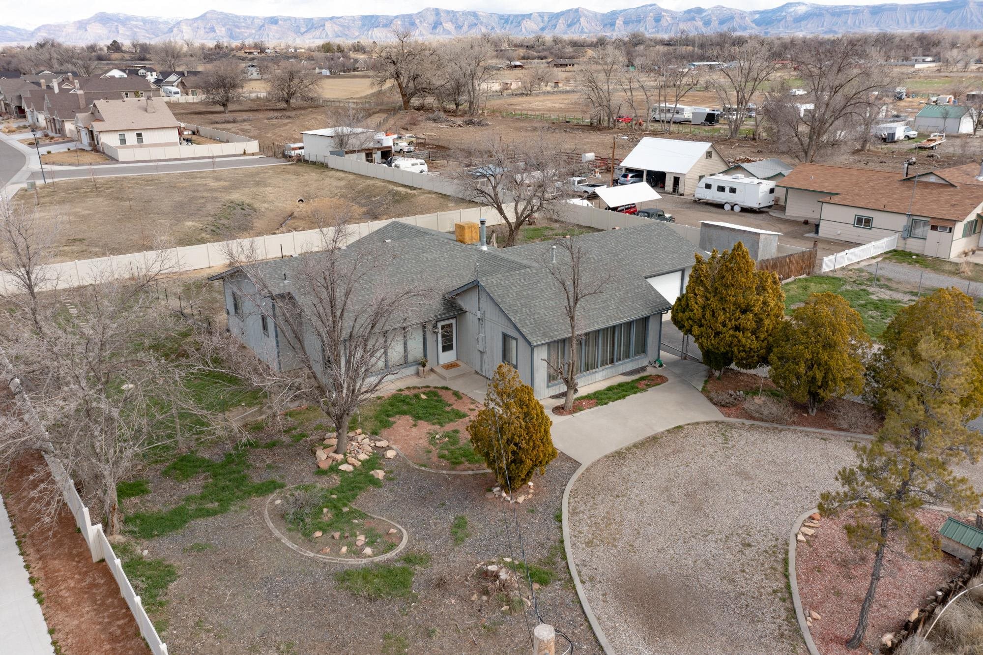2370 H Road Grand Junction, CO 81505 - Photo 1 of 26 an aerial view of a house with a yard