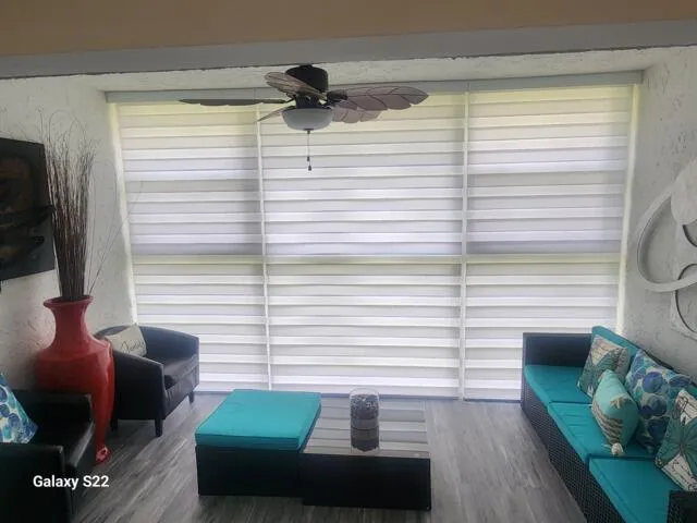a kitchen with kitchen island granite countertop a sink and a stove