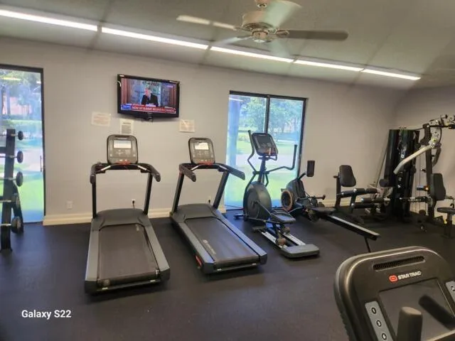 a view of swimming pool with outdoor seating