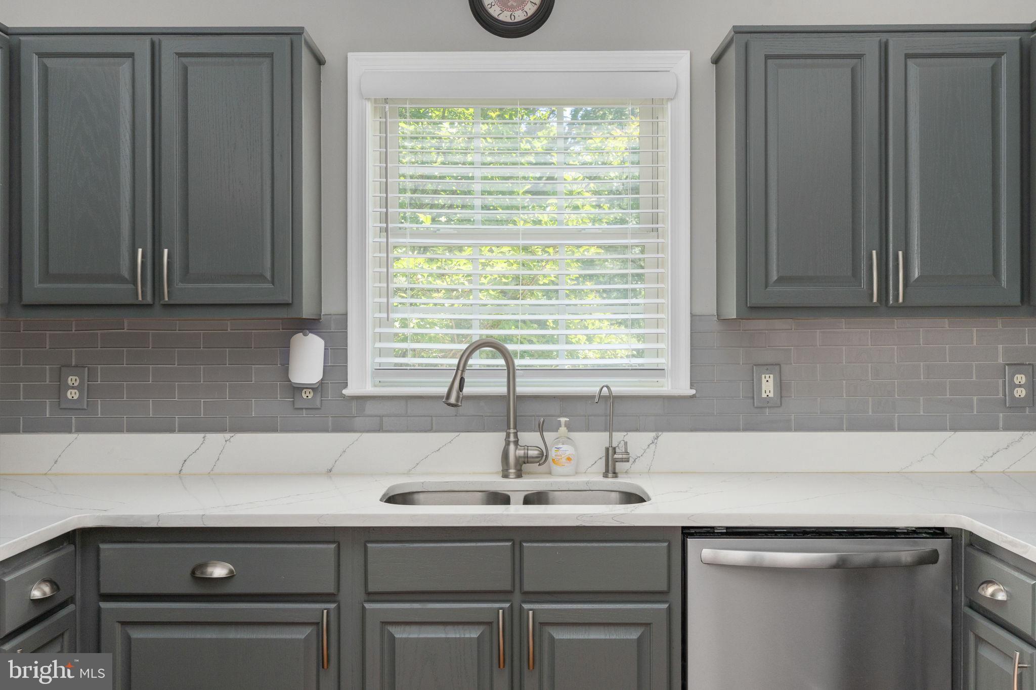 8009 Burrell Road Fredericksburg, VA 22407 - Photo 10 of 66 Modern kitchen with sleek finishes.