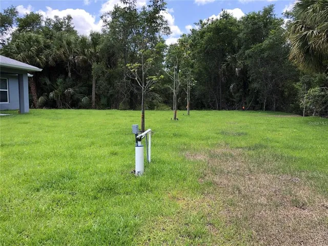 a house view with a play ground