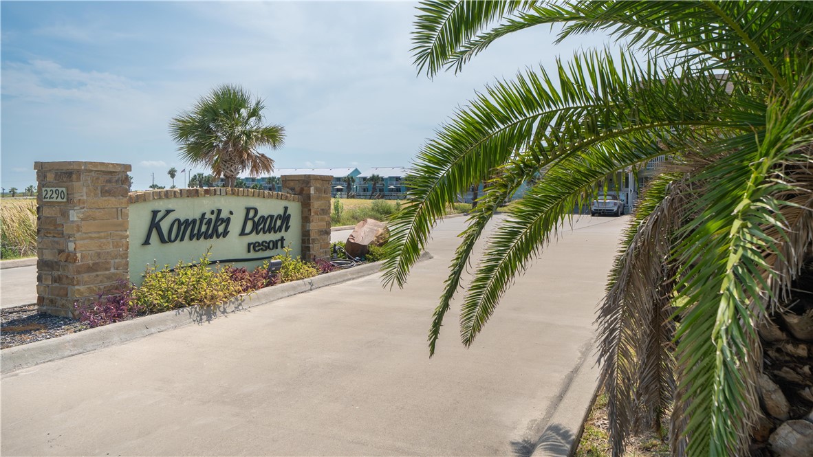 2290 North Fulton Beach Road Rockport, TX 78382 - Photo 21 of 26 a sign board with palm trees