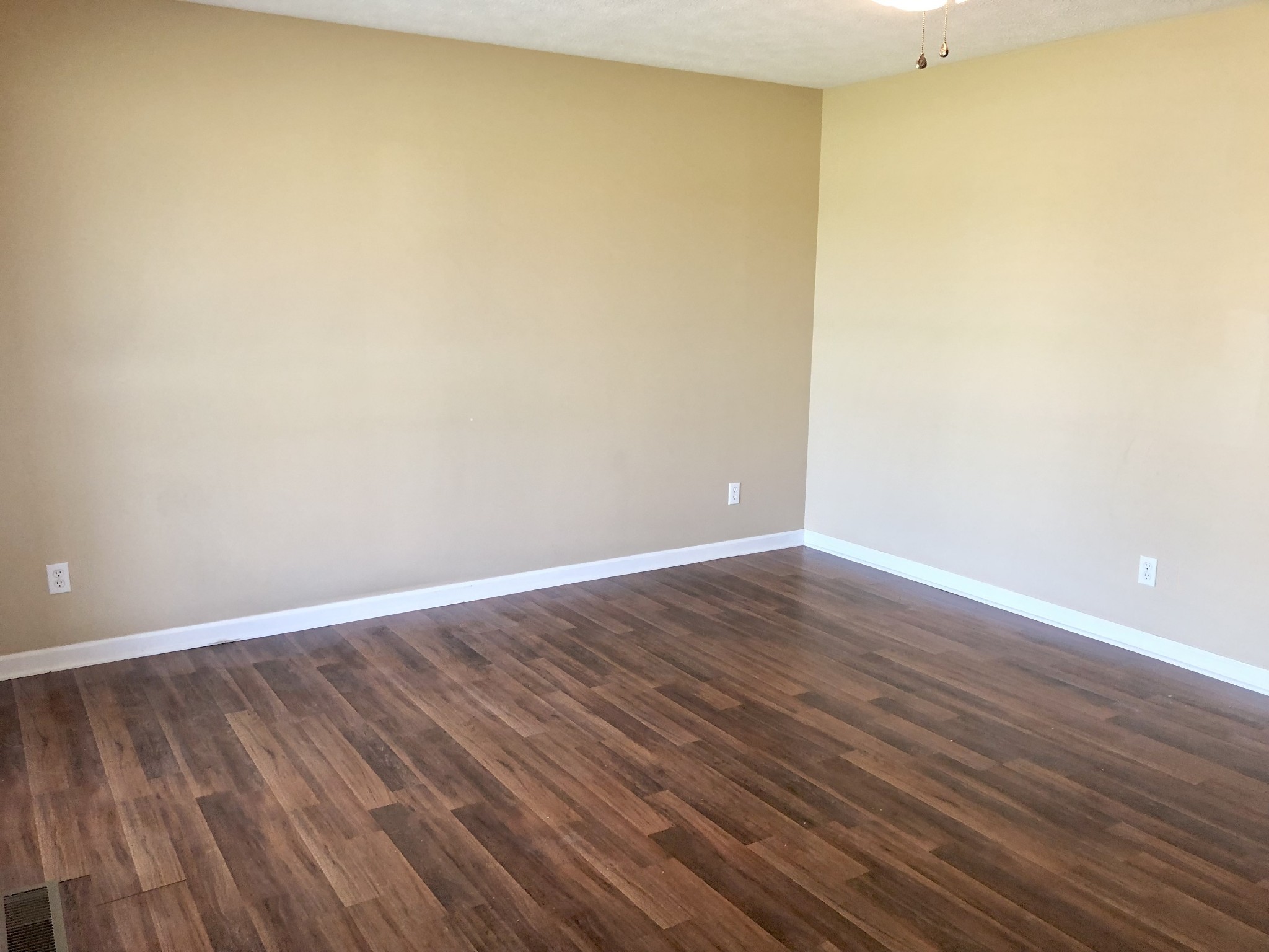 1230 Pyle Lane Hopkinsville, KY 42240 - Photo 3 of 10 a view of an empty room with wooden floor