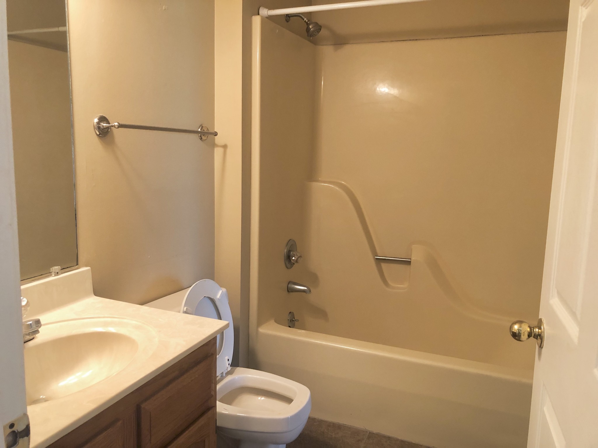1230 Pyle Lane Hopkinsville, KY 42240 - Photo 6 of 10 a bathroom with a granite countertop bathtub shower sink vanity and toilet