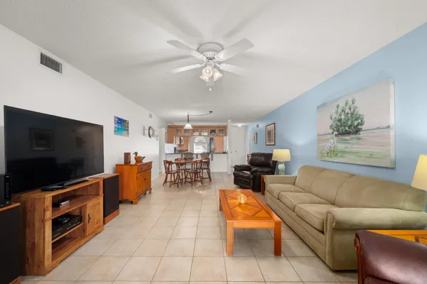 a bedroom with a bed and a television