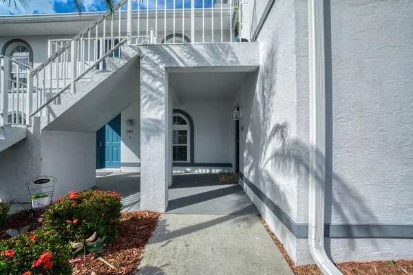 a view of a lake with houses in the back