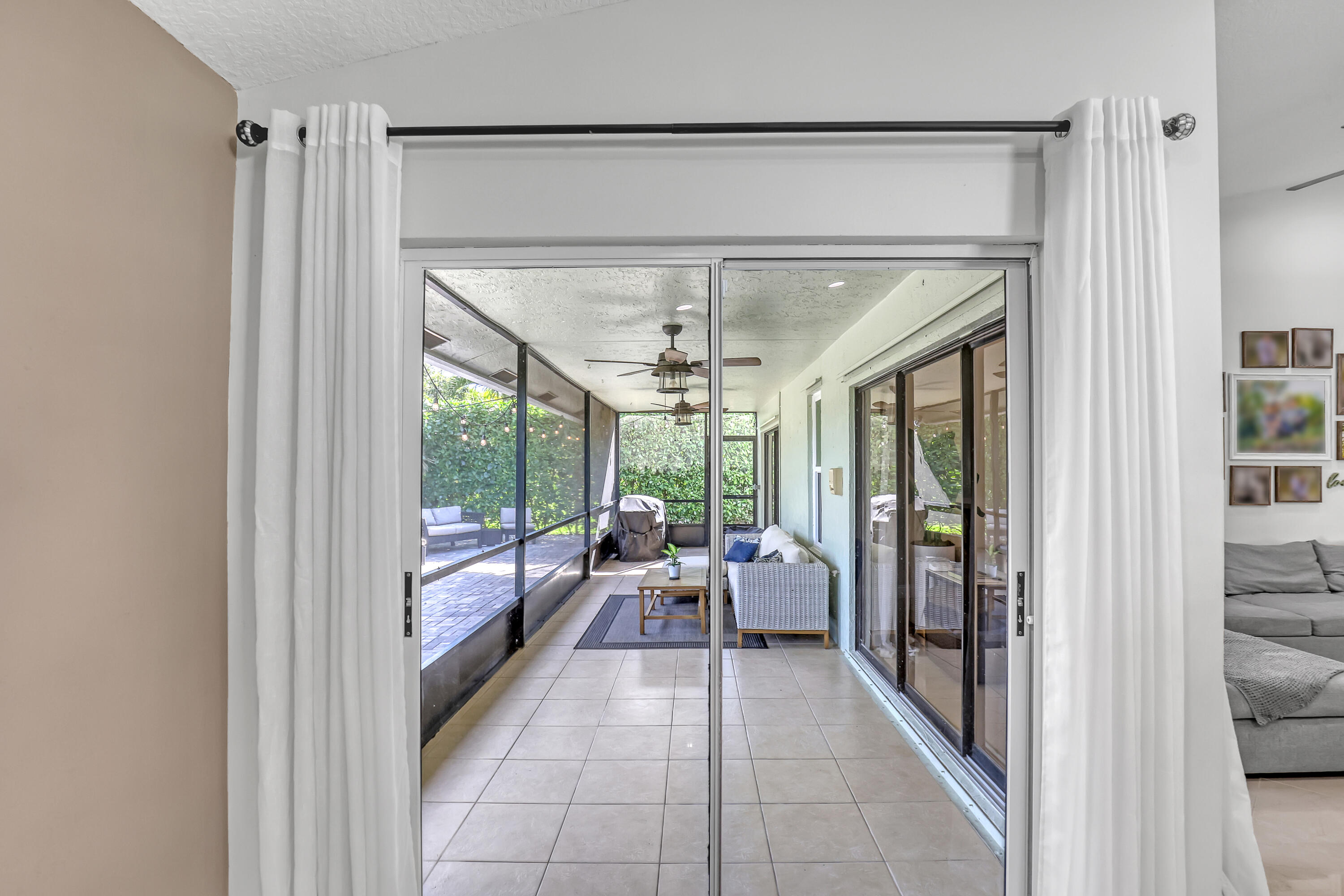 5770 Aspen Ridge Circle Delray Beach, FL 33484 - Photo 18 of 60 Dining area sliders to patio