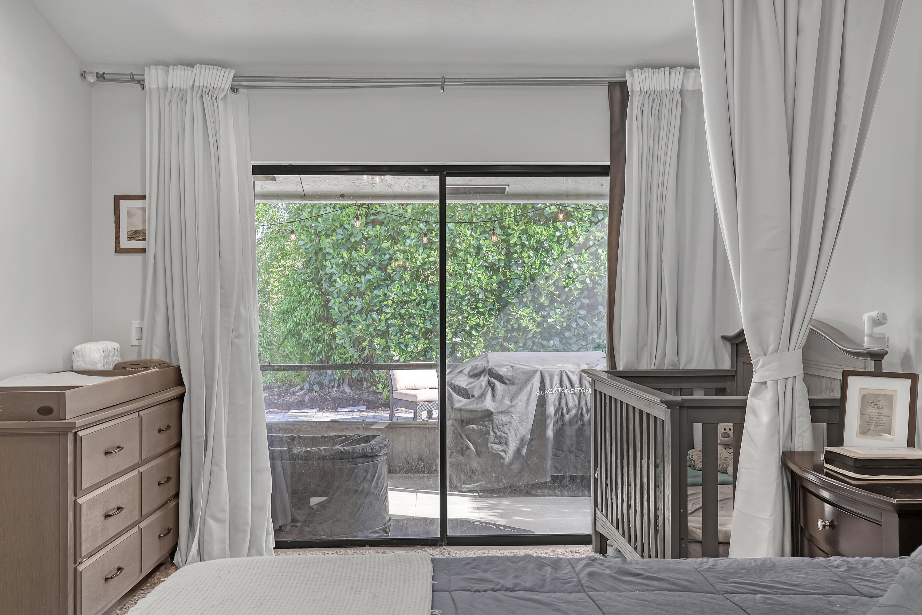5770 Aspen Ridge Circle Delray Beach, FL 33484 - Photo 25 of 60 Primary bedroom sliders to patio