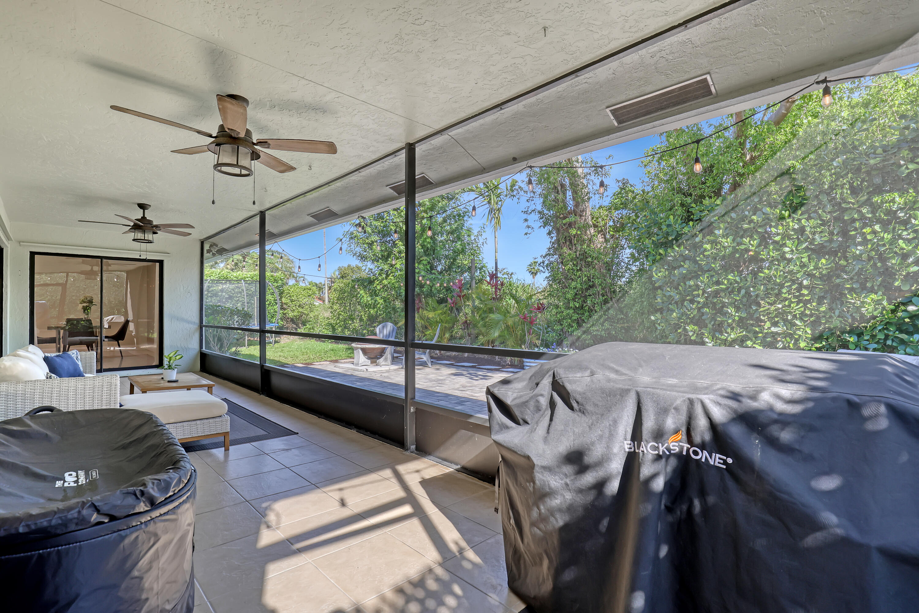 5770 Aspen Ridge Circle Delray Beach, FL 33484 - Photo 37 of 60 Screened patio