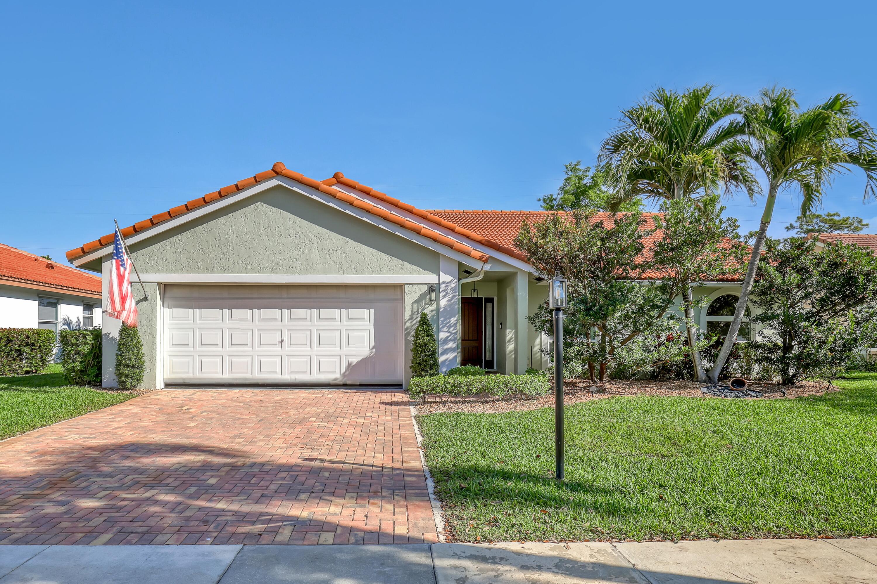 5770 Aspen Ridge Circle Delray Beach, FL 33484 - Photo 7 of 60 Front of house