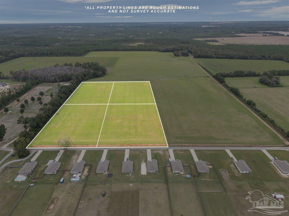 Molino Bridge Road Pace, FL 32571 - Photo 2 of 14 a view of a tennis court