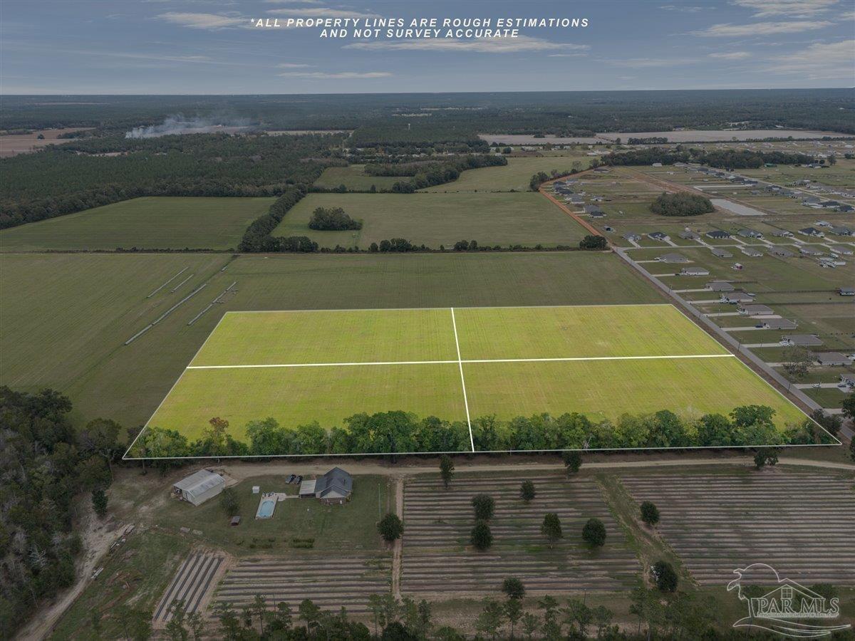 Molino Bridge Road Pace, FL 32571 - Photo 4 of 14 a view of a tennis court