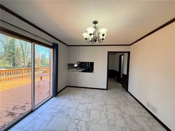 a view of a livingroom with a staircase
