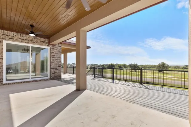 a front view of a house with a yard table and chairs