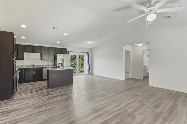 a view of kitchen with wooden floor
