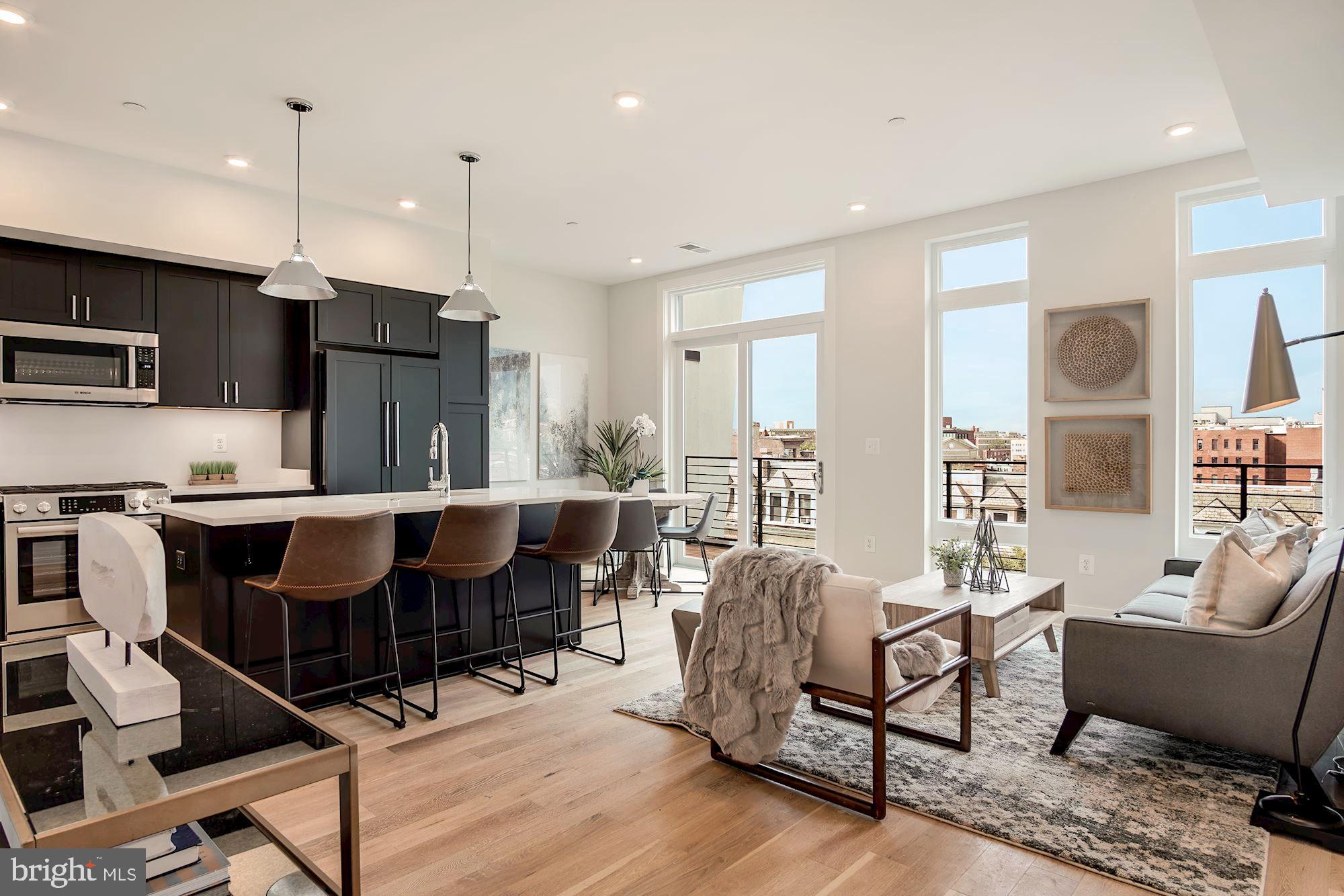 2717 Ontario Road Northwest, Unit 401 Washington, DC 20009 - Photo 2 of 19 Open Concept Kitchen, Living, & Dining