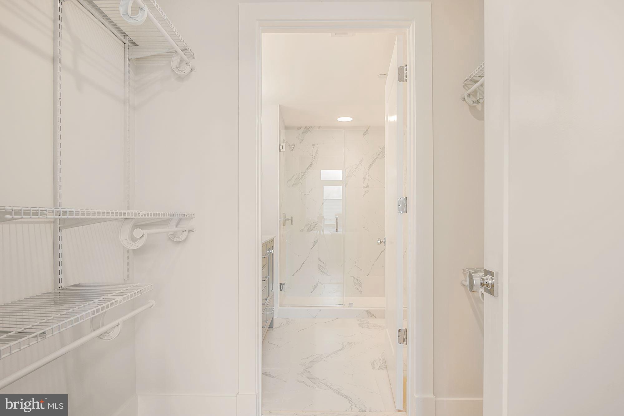 2717 Ontario Road Northwest, Unit 401 Washington, DC 20009 - Photo 11 of 19 Walk-In Closet