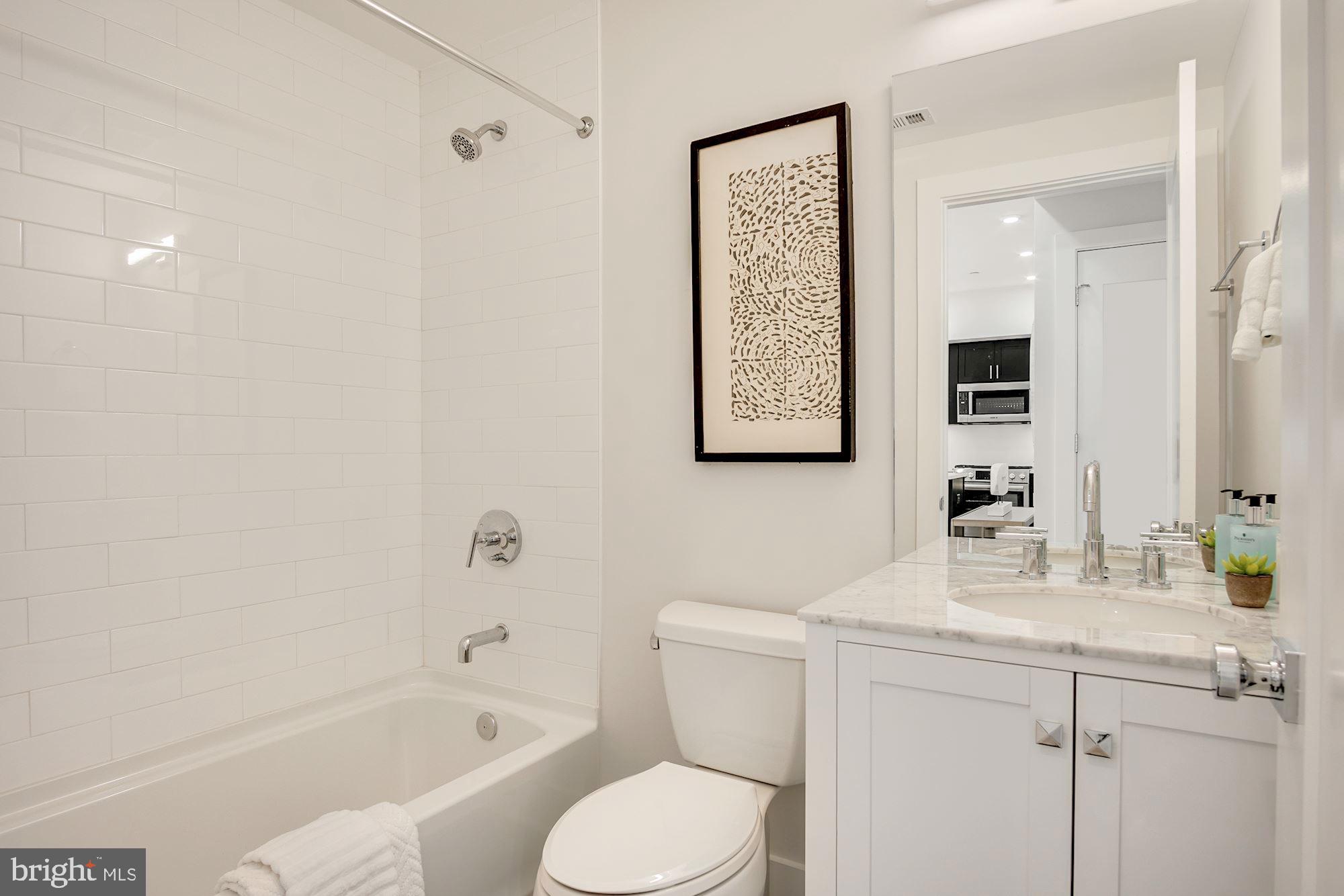 2717 Ontario Road Northwest, Unit 401 Washington, DC 20009 - Photo 14 of 19 Guest Bathroom