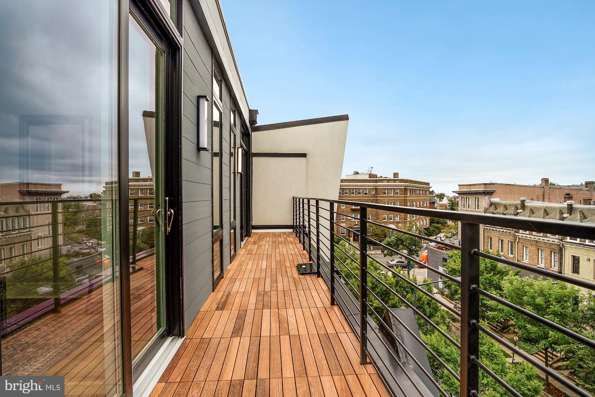 2717 Ontario Road Northwest, Unit 401 Washington, DC 20009 - Photo 16 of 19 Expansive Balcony w/ Incredible Views