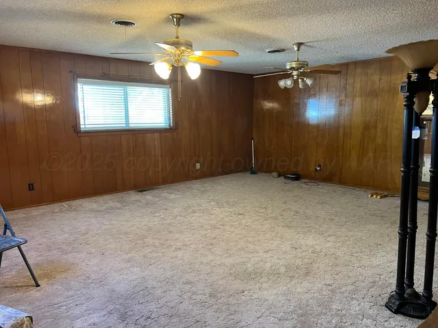 a bathroom with a granite countertop sink a toilet and bathtub