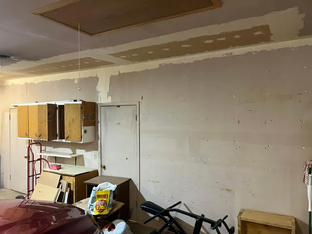 a room with furniture and gym equipment