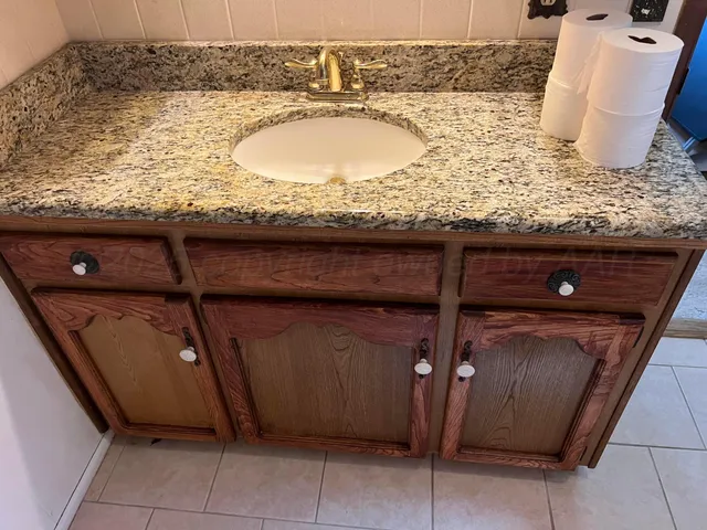 a view of a garden with an ocean view