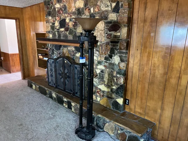 a view of garden with wooden fence