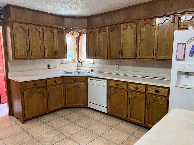 a view of a refrigerator in a bathroom