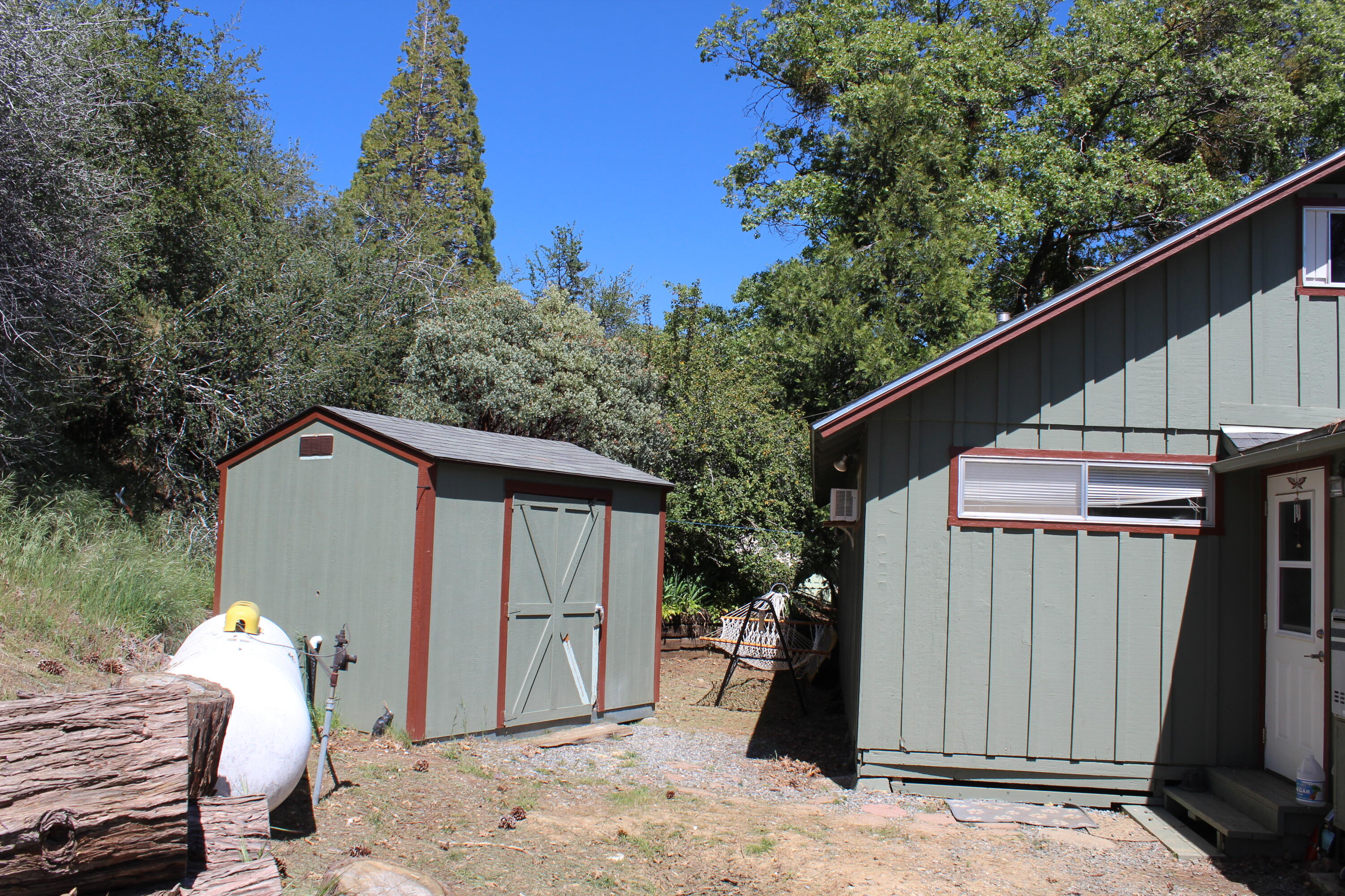 427 Sutherland Drive Springville, CA 93265 - Photo 43 of 55 Shed and on side of house is charging station for electric vehicles
