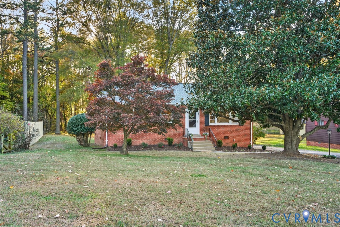 2008 Adkins Road North Chesterfield, VA 23236 - Photo 2 of 31 Under the shade of a magnolia and the color of a r