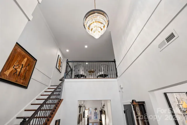 a view of entryway with stairs and wooden floor