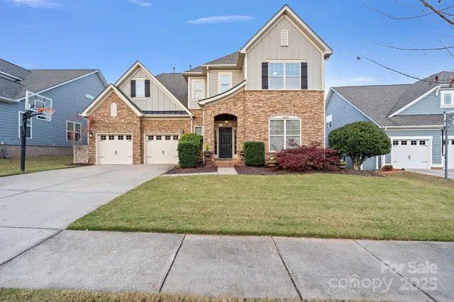 front view of a house with a yard
