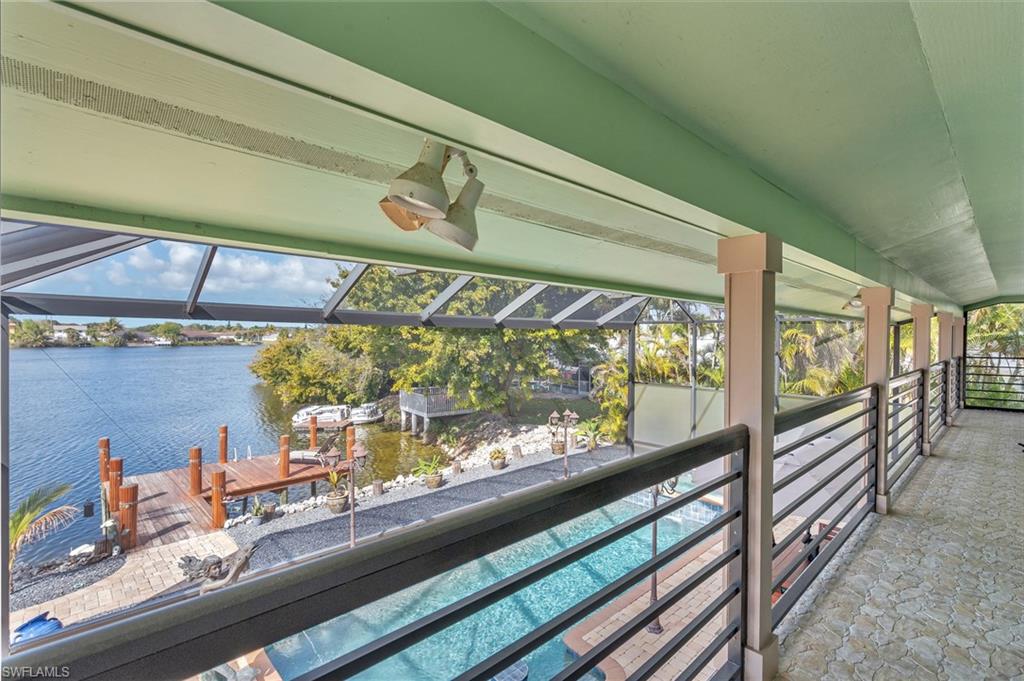 3001 50th Street Southwest Naples, FL 34116 - Photo 16 of 46 a view of a room with wooden floor