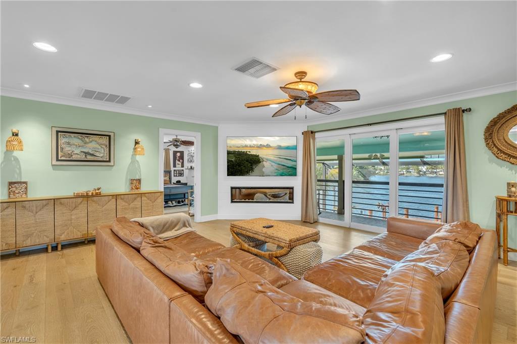 3001 50th Street Southwest Naples, FL 34116 - Photo 24 of 46 a view of a bedroom with a large window