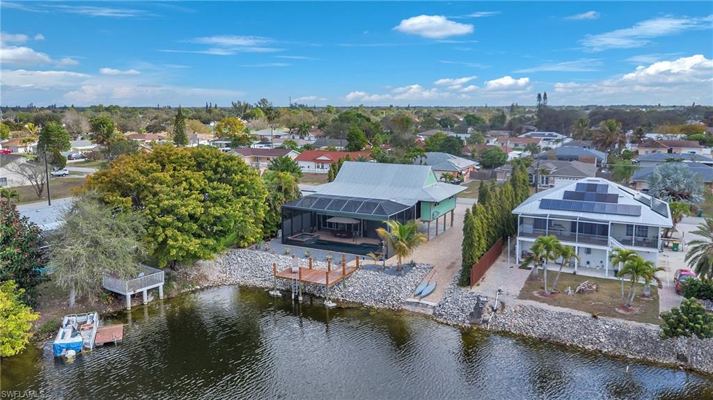3001 50th Street Southwest Naples, FL 34116 - Photo 37 of 46 a view of a lake in middle of the town