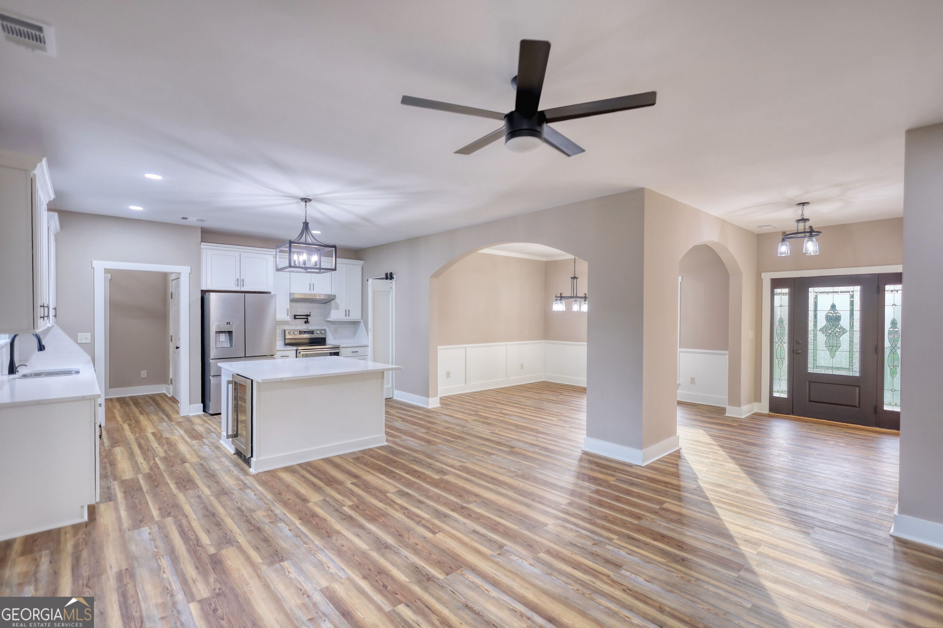 2941 Old Buckhead Road Madison, GA 30650 - Photo 12 of 58 a view of kitchen with cabinets and wooden floor