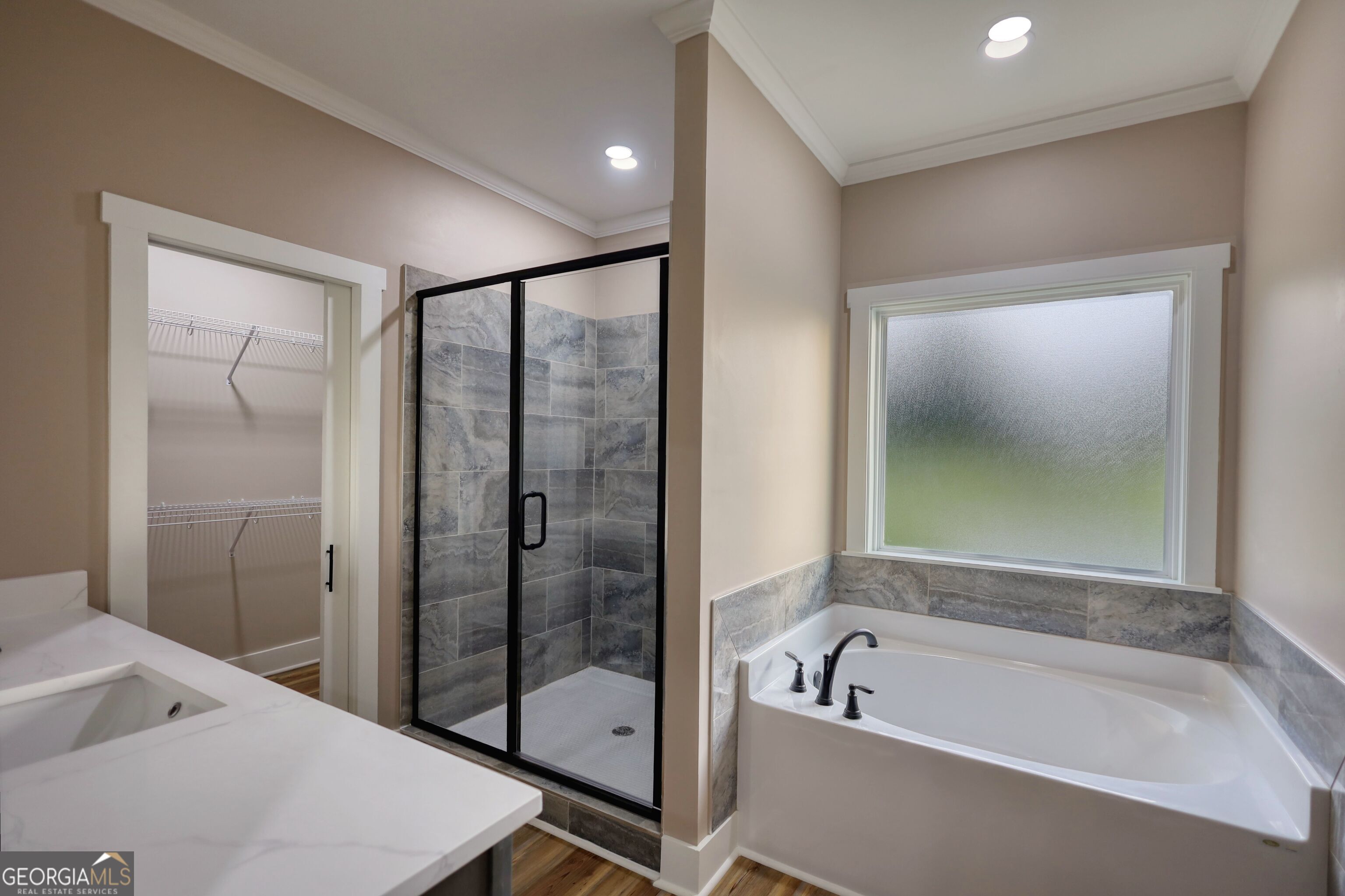 2941 Old Buckhead Road Madison, GA 30650 - Photo 32 of 58 a bathroom with a bathtub and shower