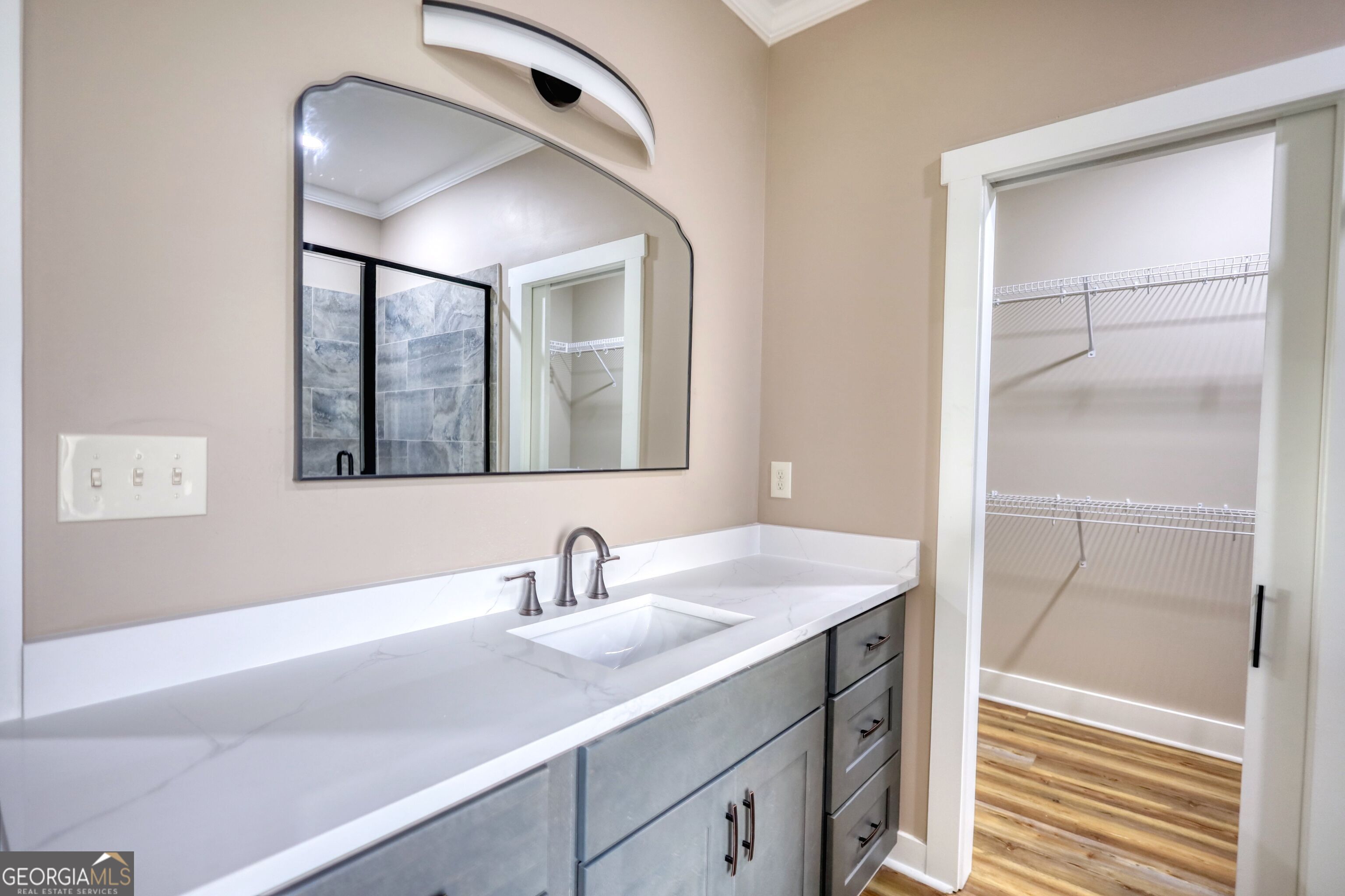 2941 Old Buckhead Road Madison, GA 30650 - Photo 34 of 58 a bathroom with a sink and a mirror